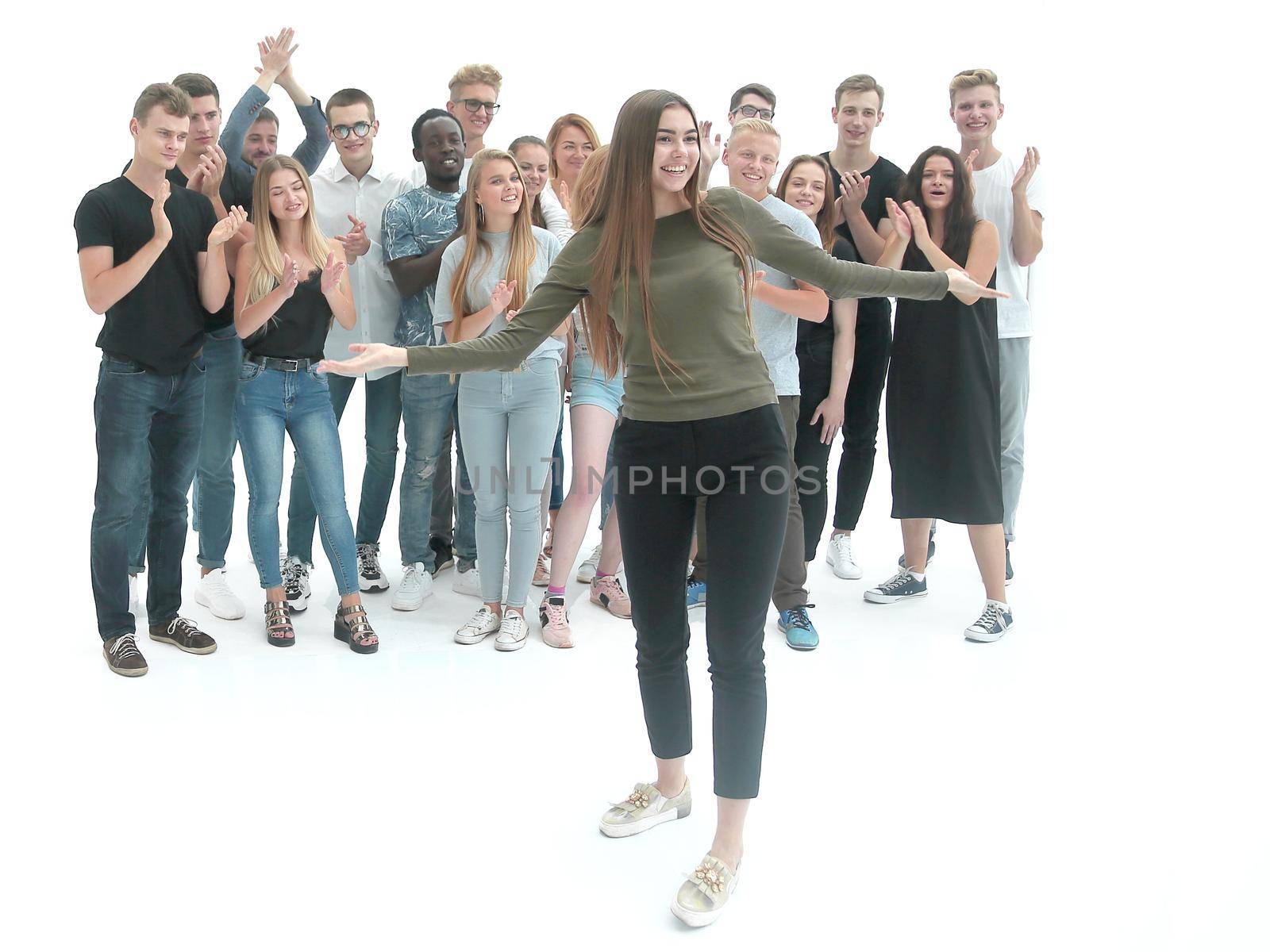 young woman standing in front of her friends team by asdf