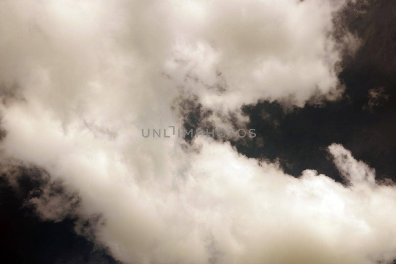 Dark sky before a thunderstorm. White clouds. The background of nature