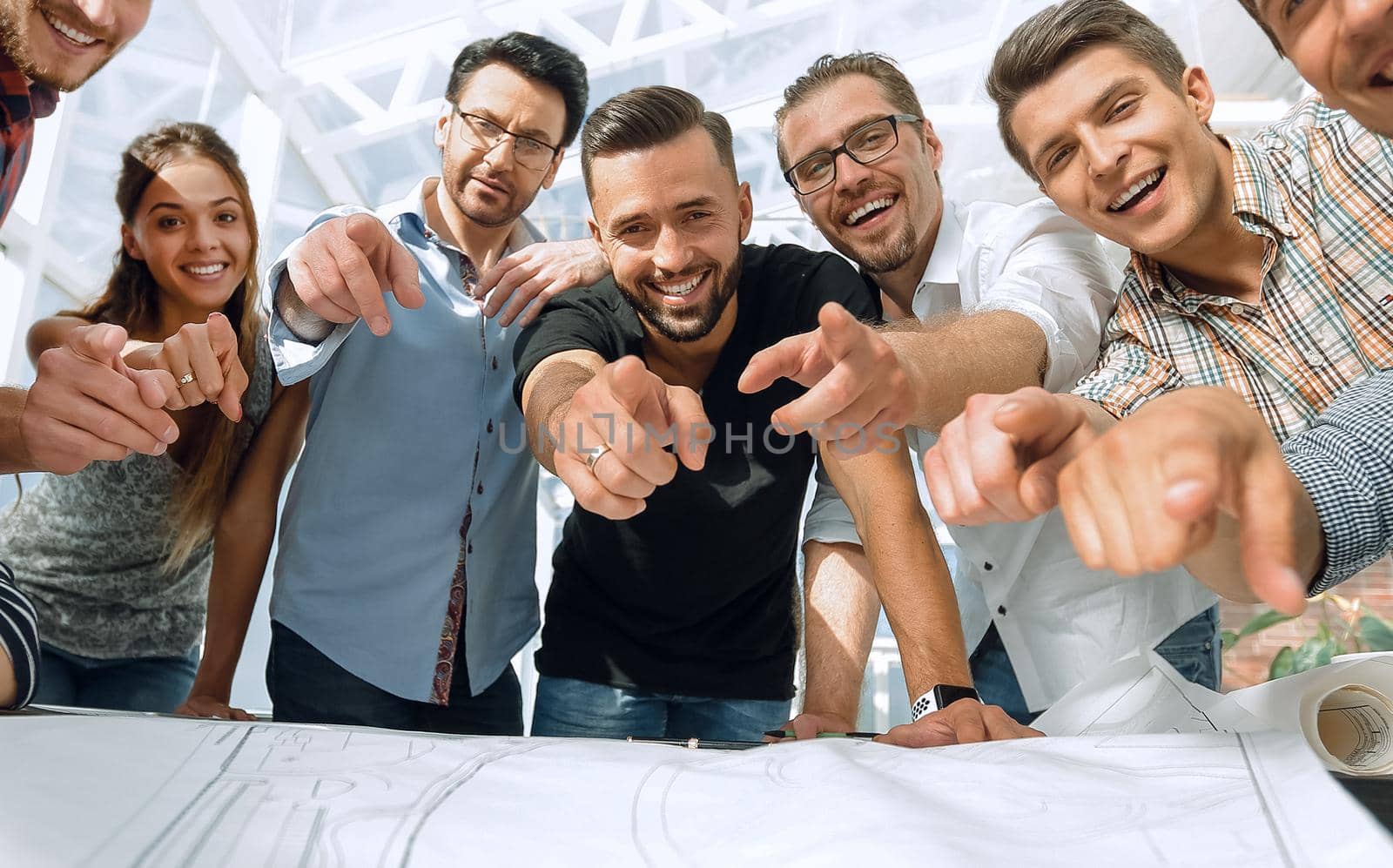 creative business team pointing at you.photo with copy space