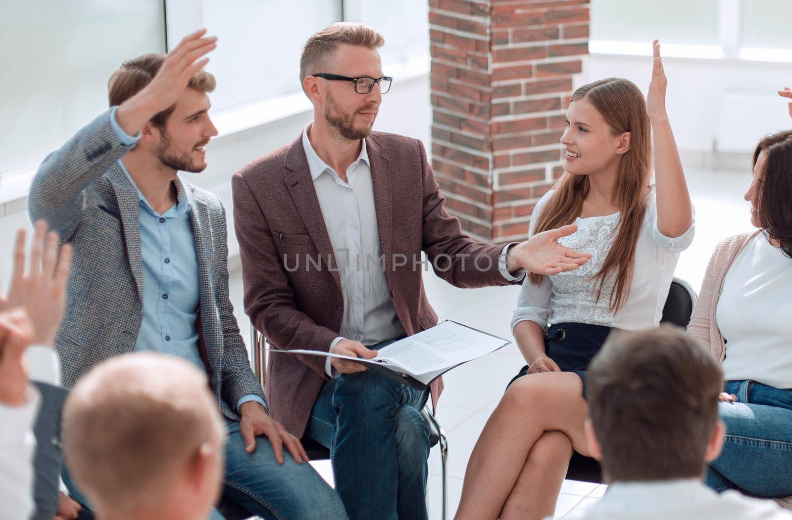 corporate team votes during a business meeting. business concept