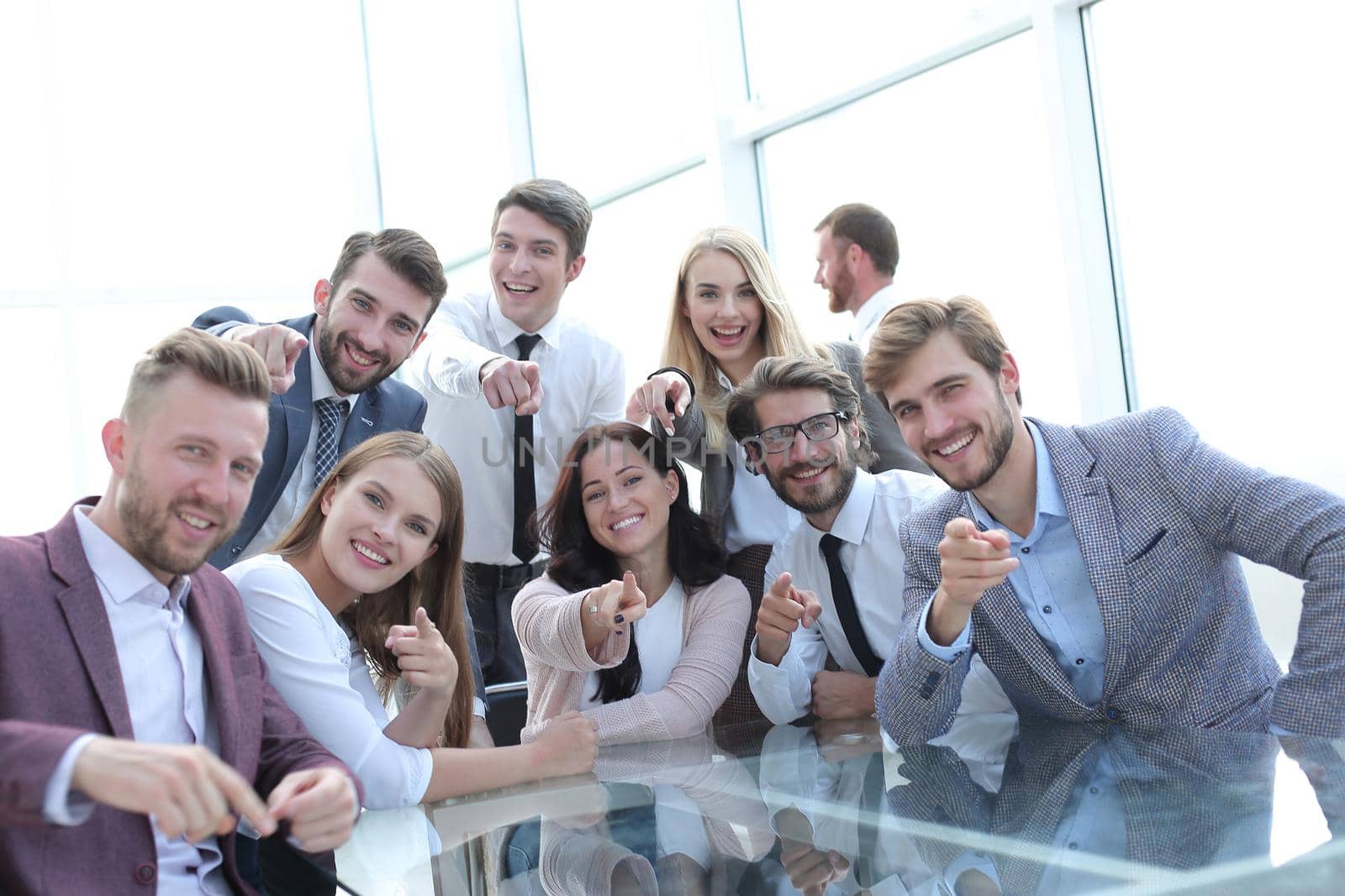 successful business team is pointing at you. business concept