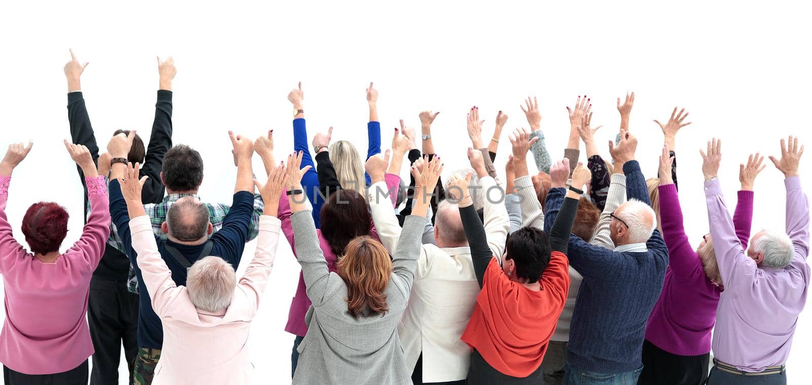 top view. group of diverse adults pointing at a white screen. photo with a copy-space