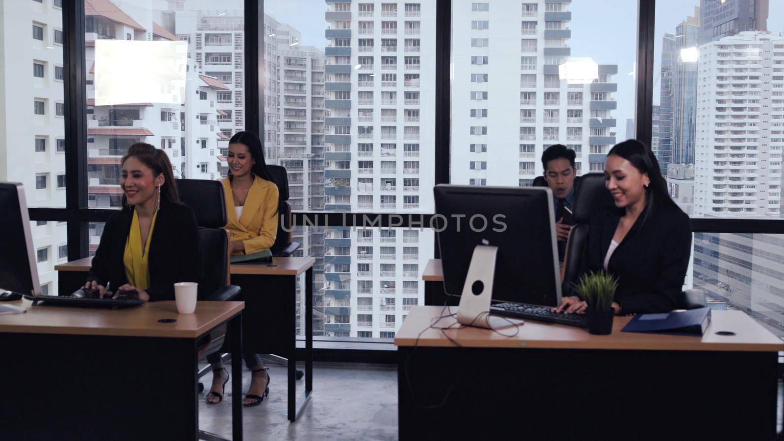 Business people working with desktop computer. by biancoblue