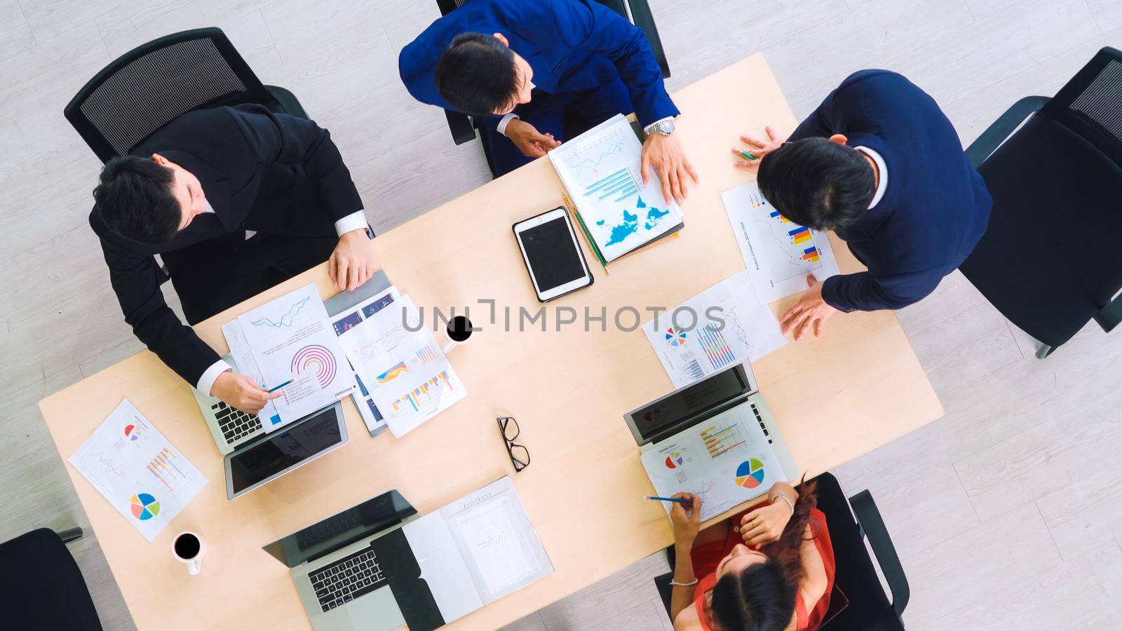 Business people group meeting shot from top view by biancoblue