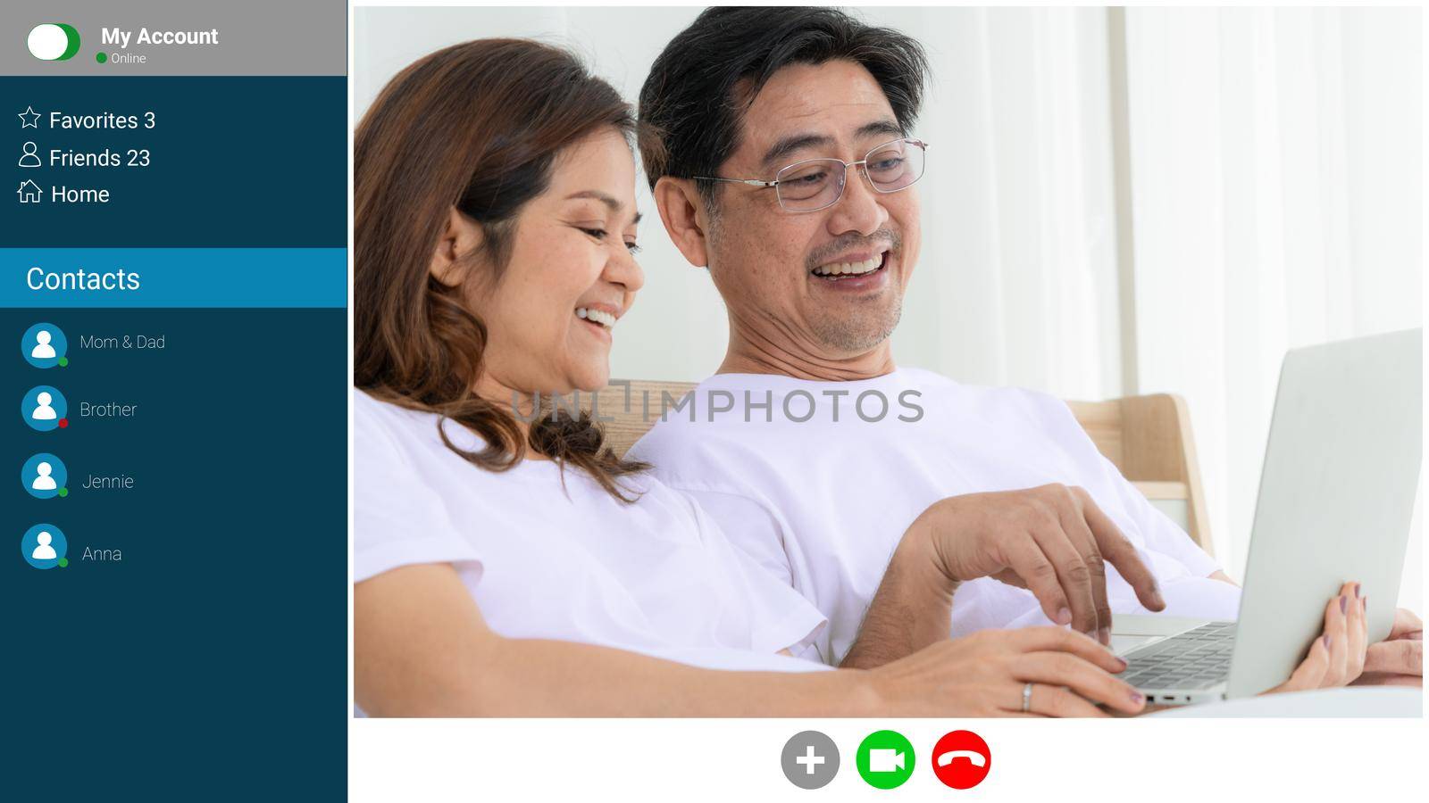 Happy family talking on internet video call at home while laughing with love . Online technology for mature parents . Webcam application in cropped zoom view of computer screen monitor .