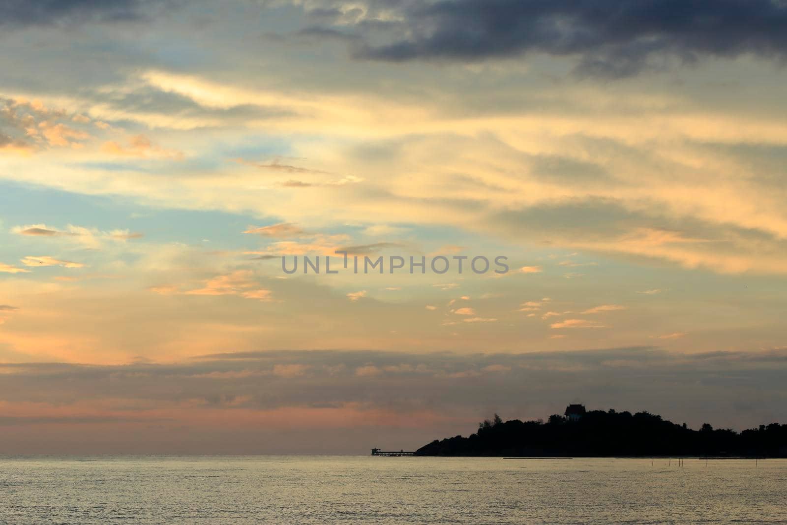 photograph of the sunrise from the sea and the beautiful sky and morning clouds