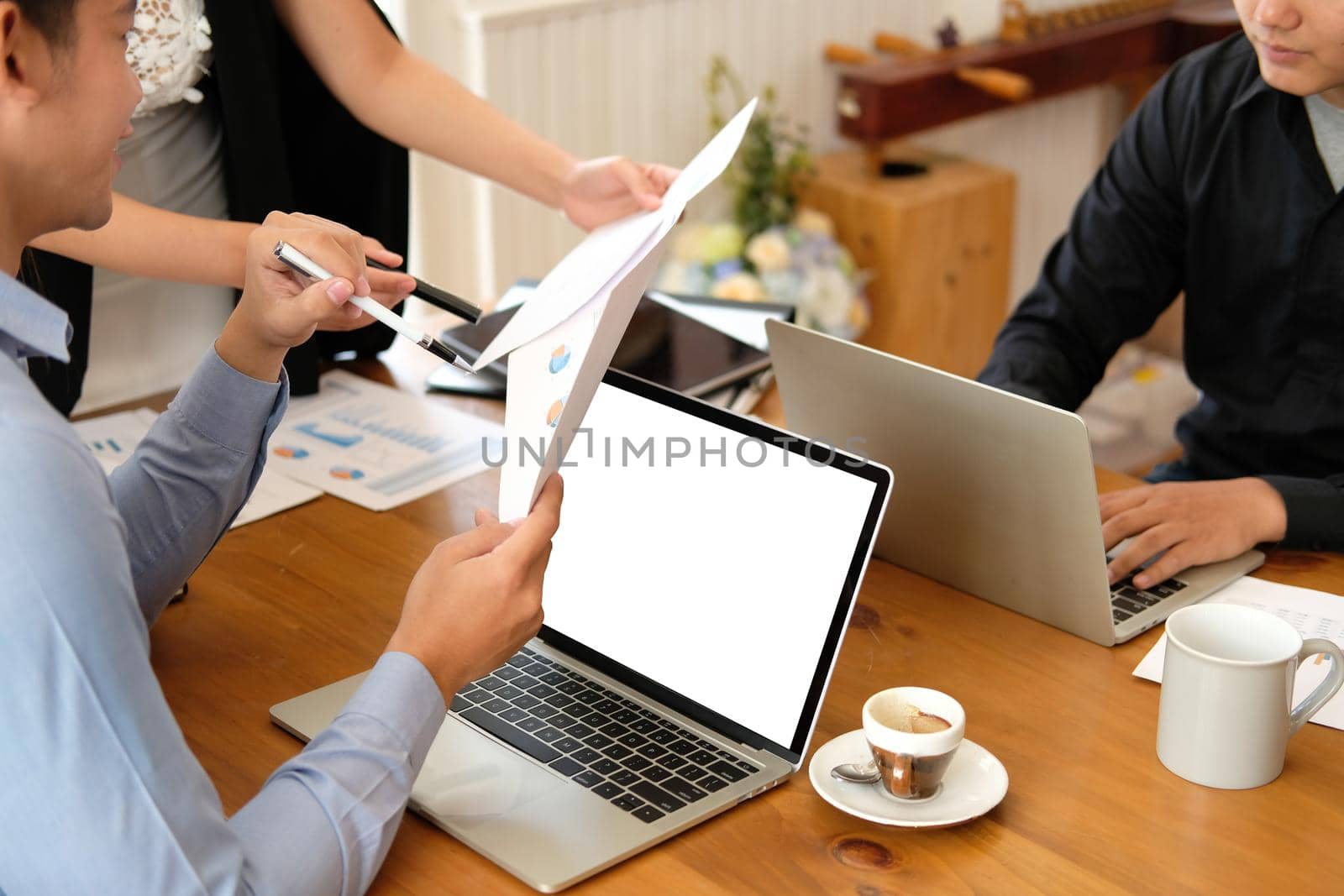 executive businesswoman advising analyzing discussing business project with co-worker team