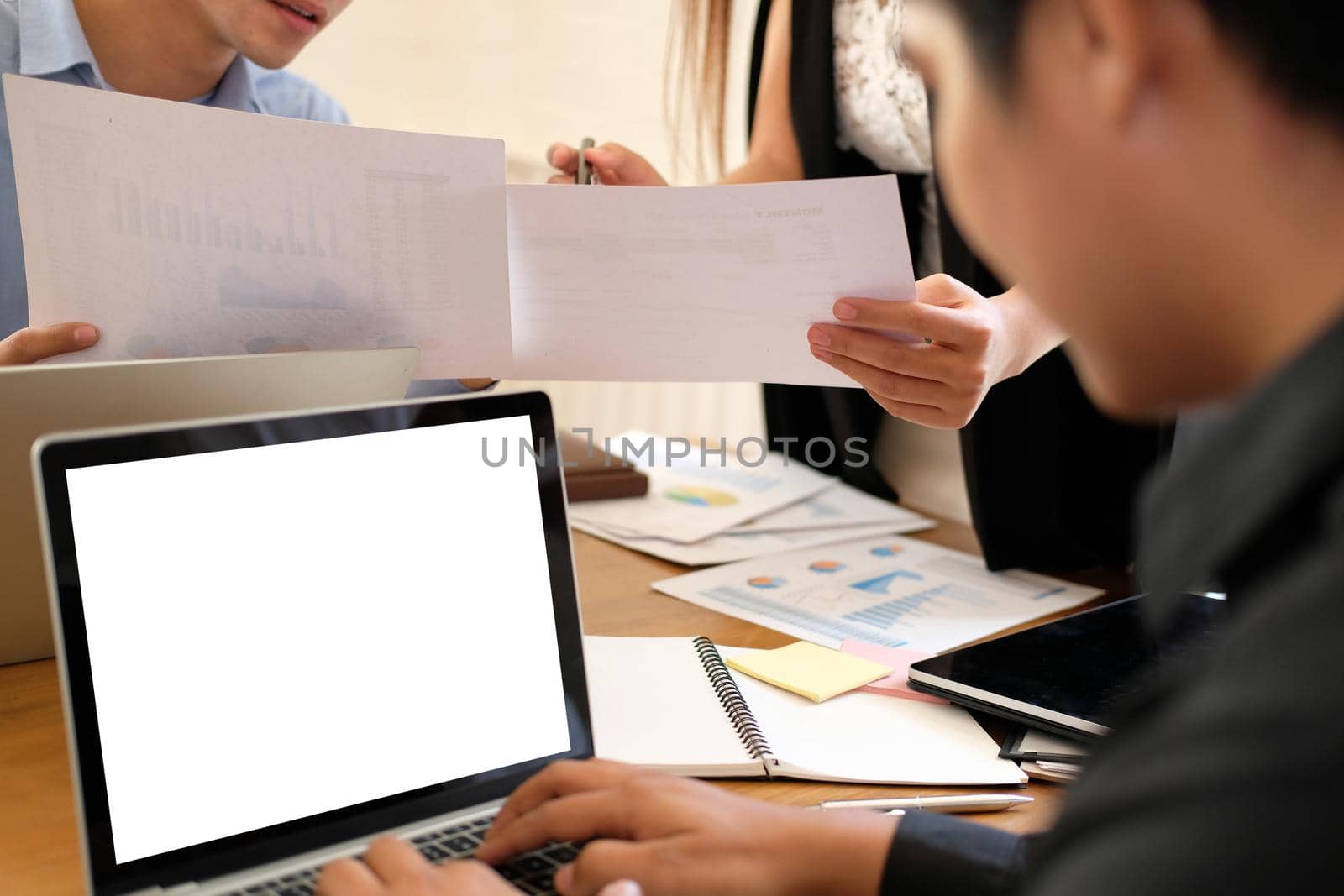 executive businesswoman advising analyzing discussing business project with co-worker team