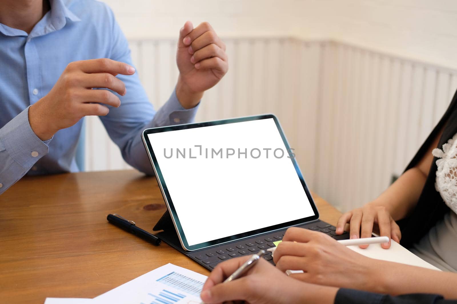 businesswoman working discussing with colleague. business people have a meeting. businessman working on startup project with co-worker team.