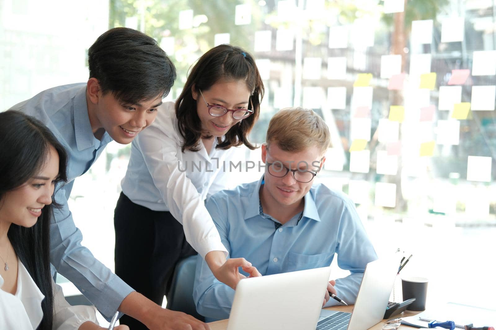 business people discussing on performance revenue in meeting. businessman working with co-worker team. financial adviser analyzing data with investor.