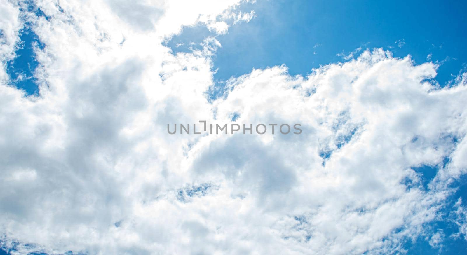 Blue sky with clouds selective focus by mila1784