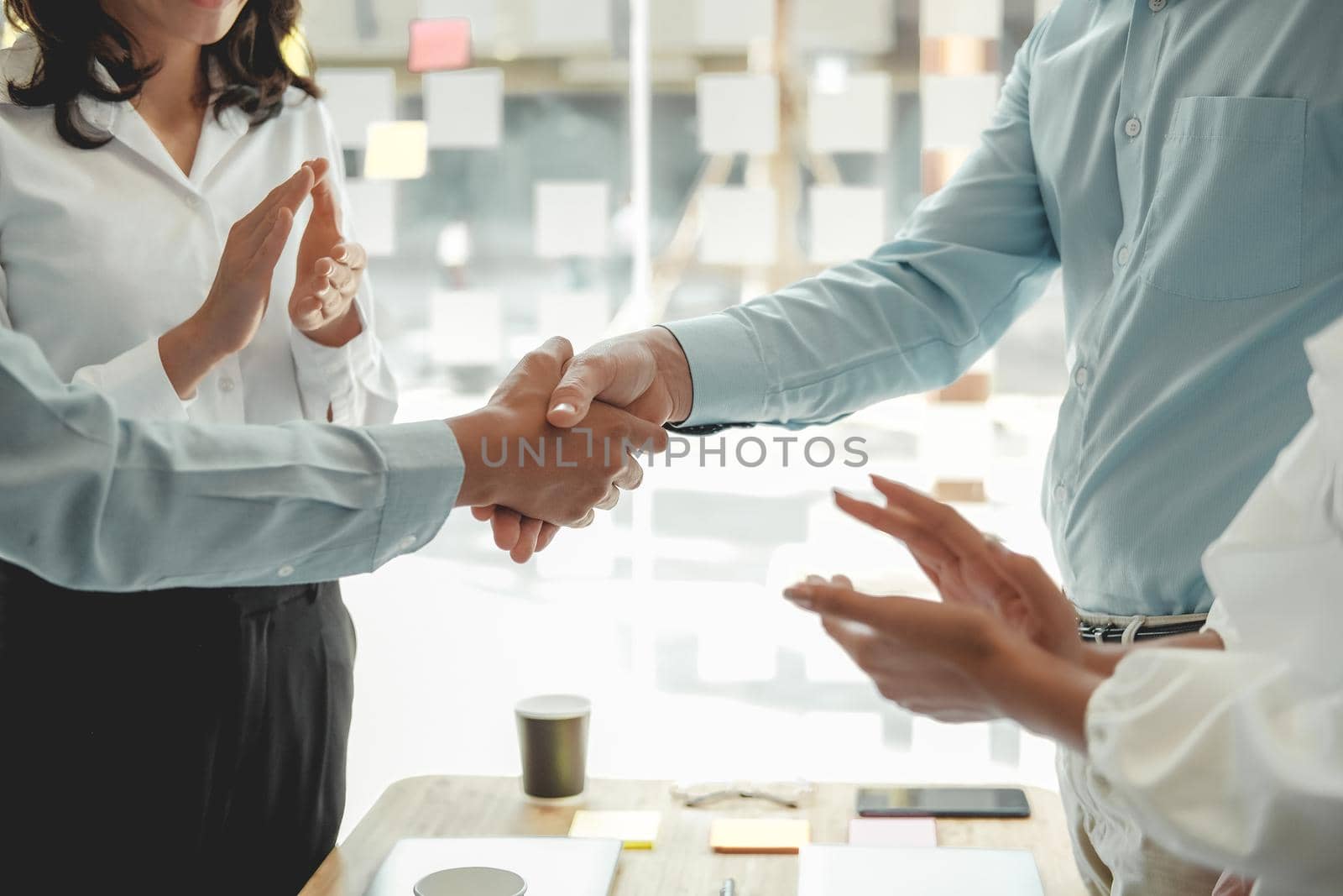 businessman shaking hands after meeting. Business people handshaking. Greeting deal, teamwork partnership concept.