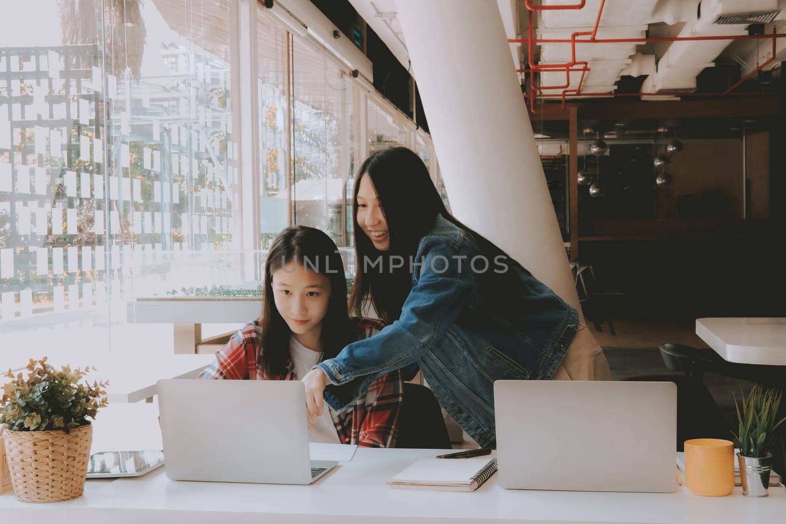 girl teenager college high school student studying with computer laptop