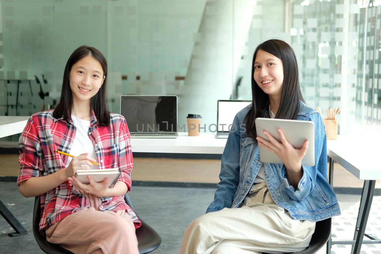 girl teenager studying with tablet .college high school student taking notes