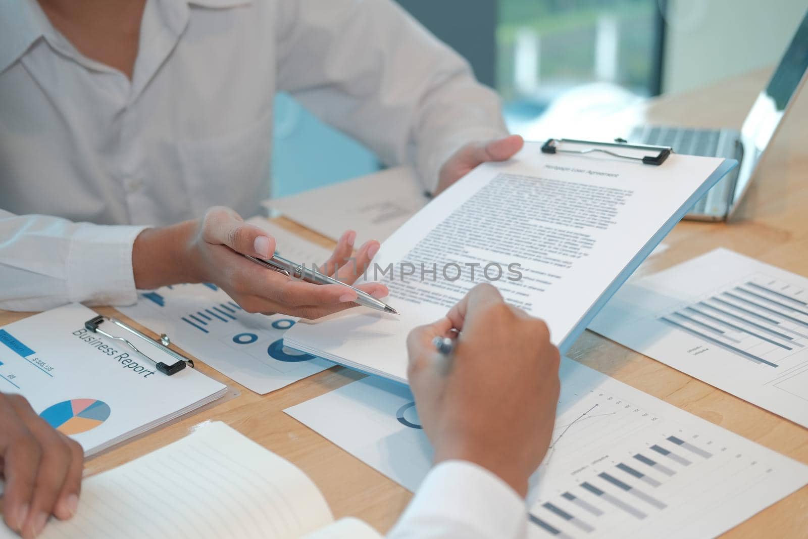 businessman investor signing contract agreement with business partner. closing deal in investment
