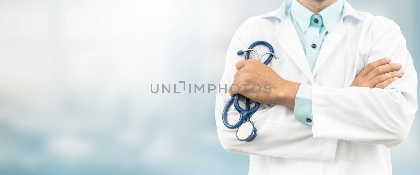Doctor in hospital background with copy space. Healthcare and medical concept.