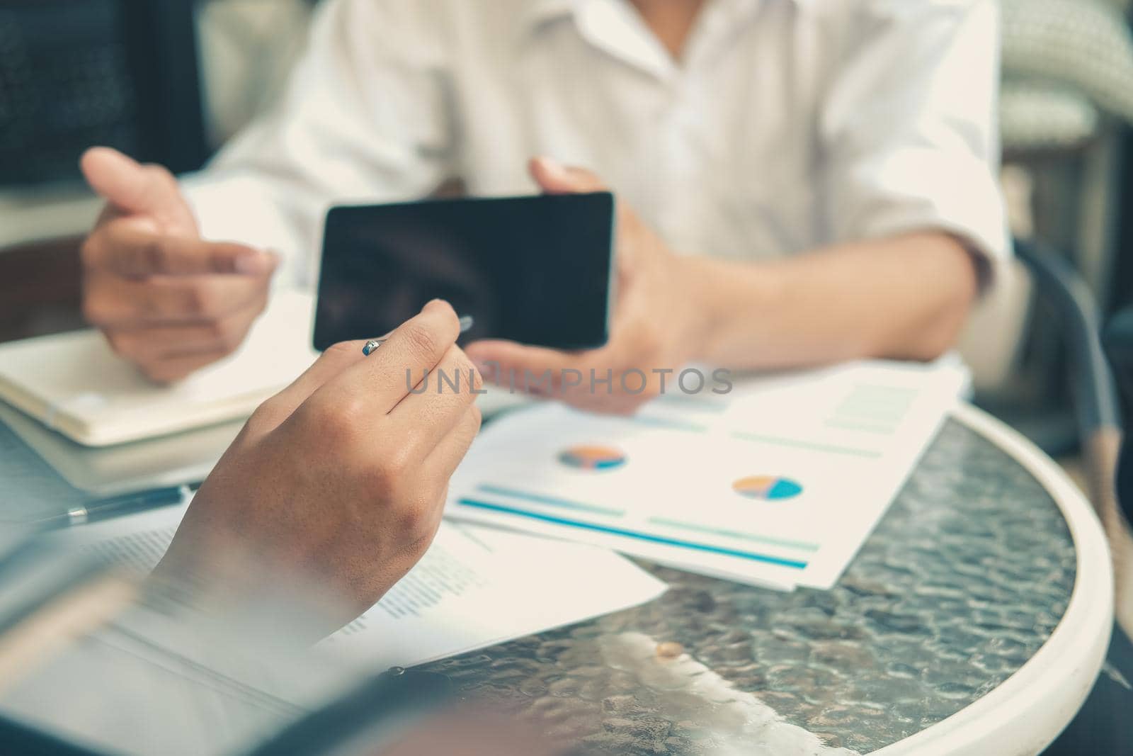 businessman signing contract with digital pen on mobile phone. man giving electronic signature on smartphone. technology in business