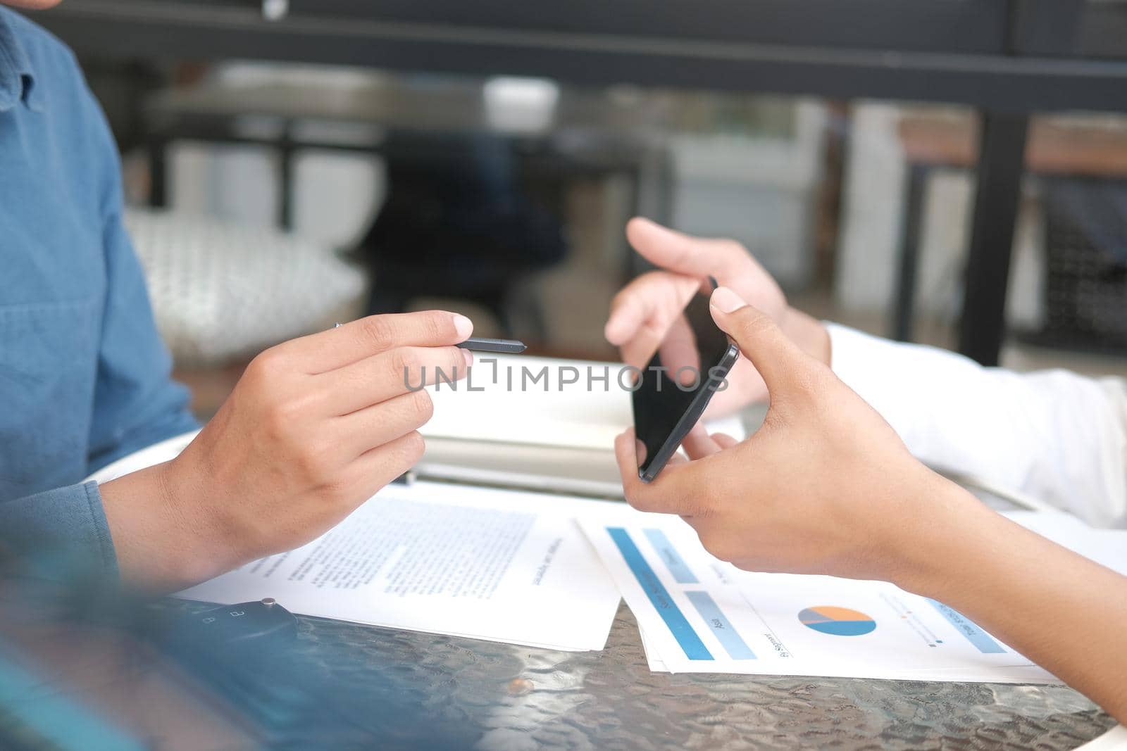 businessman signing contract with digital pen on mobile phone. man giving electronic signature on smartphone. technology in business