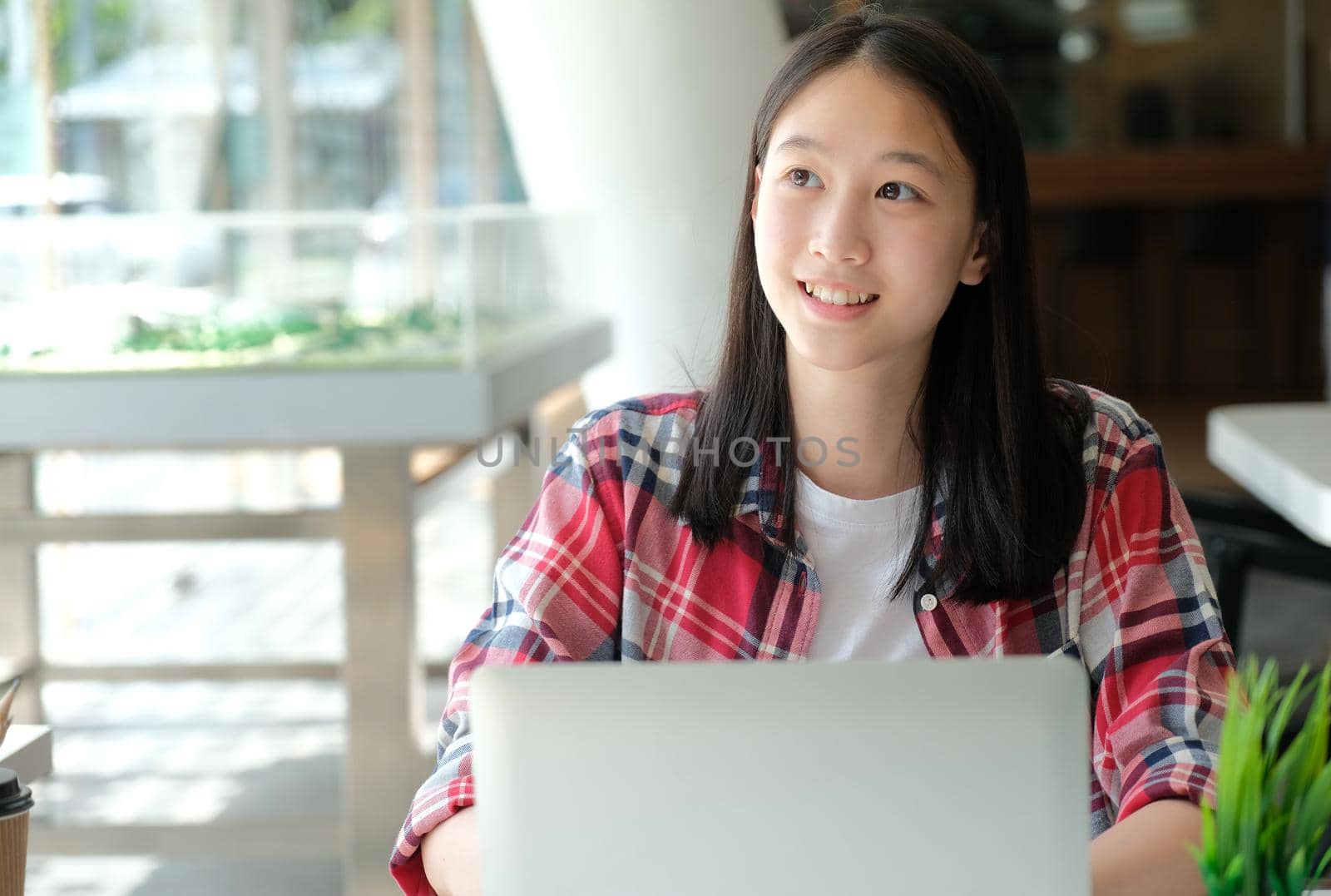 girl teenager college high school student studying with computer laptop