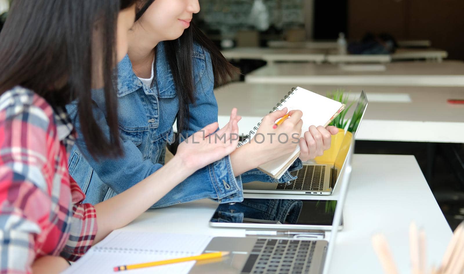 girl teenager studying with computer laptop. college high school student taking note