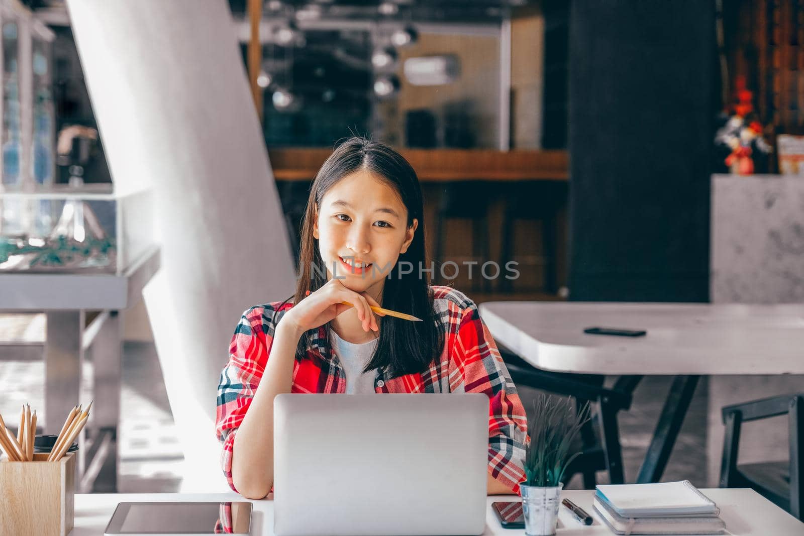 girl teenager college high school student studying with computer laptop