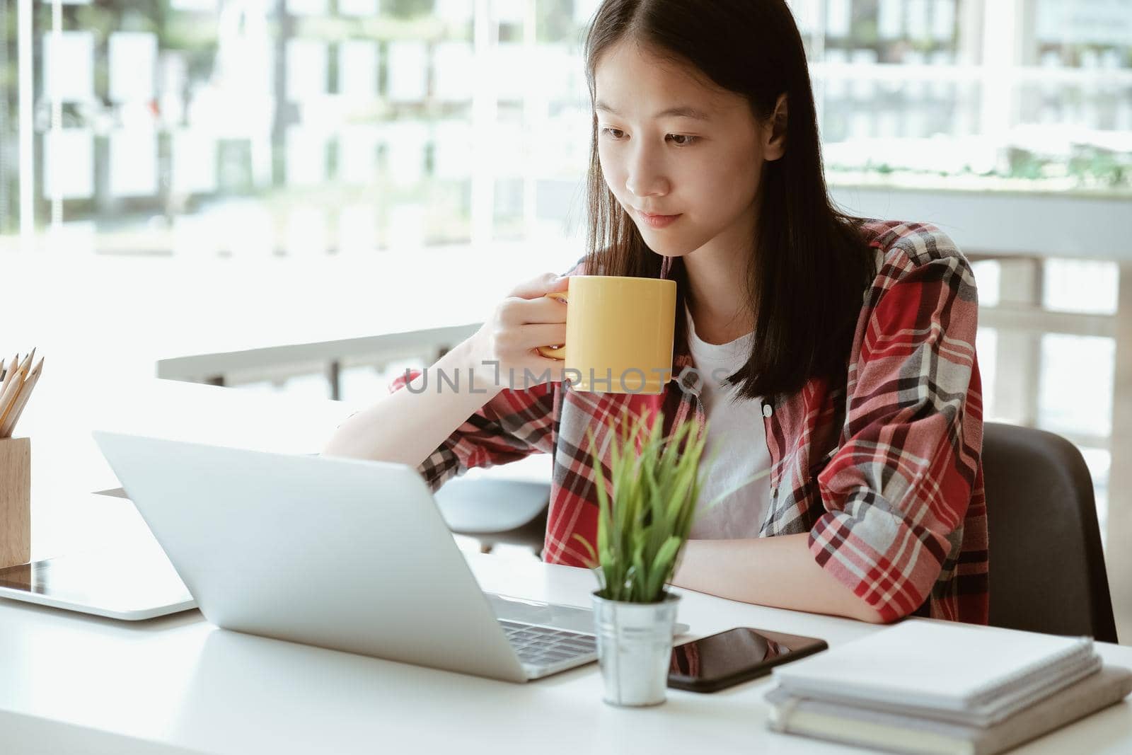 girl teenager college high school student studying with computer laptop