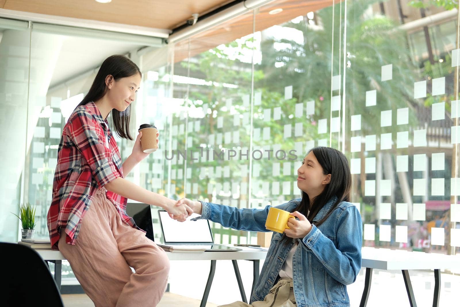 asian girl teenager friends shaking hands. teamwork, friendship by pp99