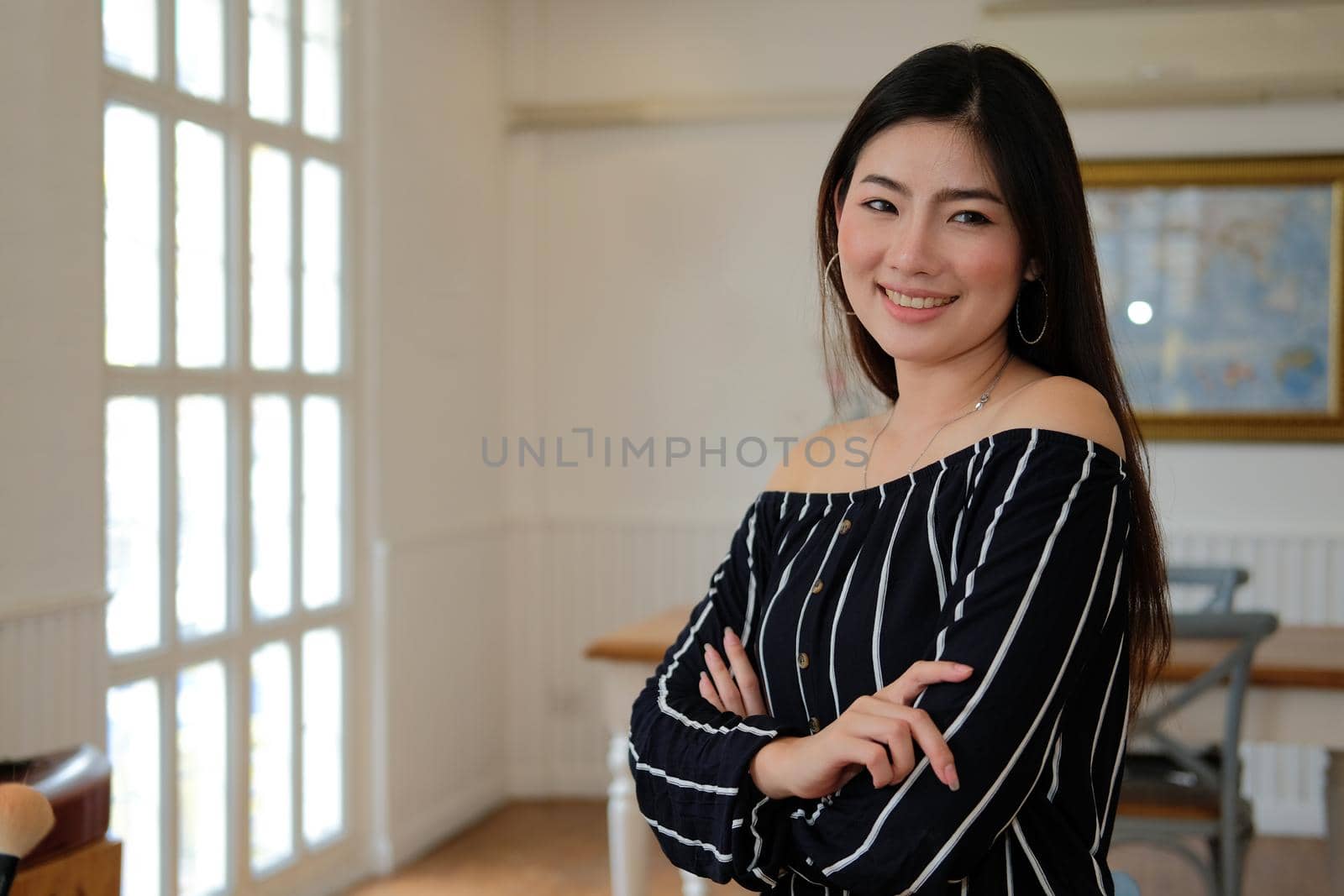 young asian woman smiling posing at home