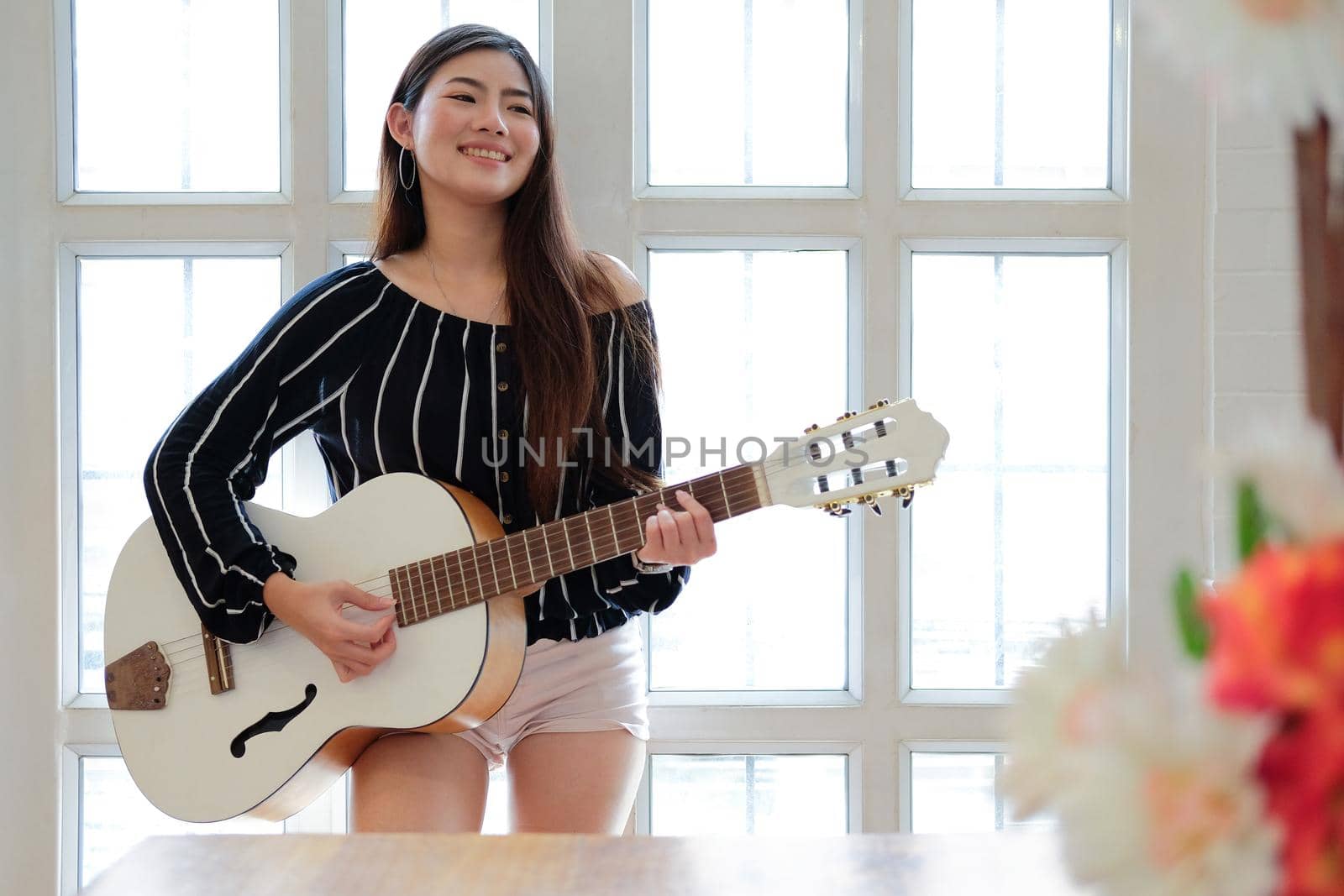 woman playing guitar. leisure lifestyle concept  by pp99