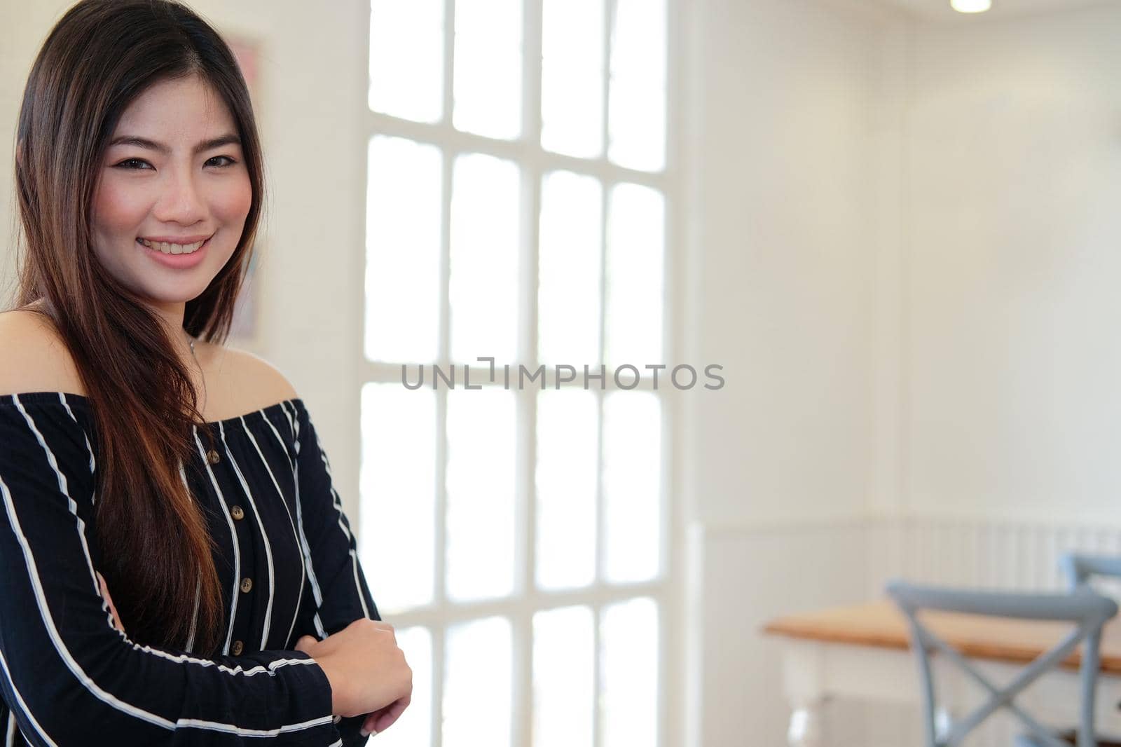 young asian woman smiling posing at home