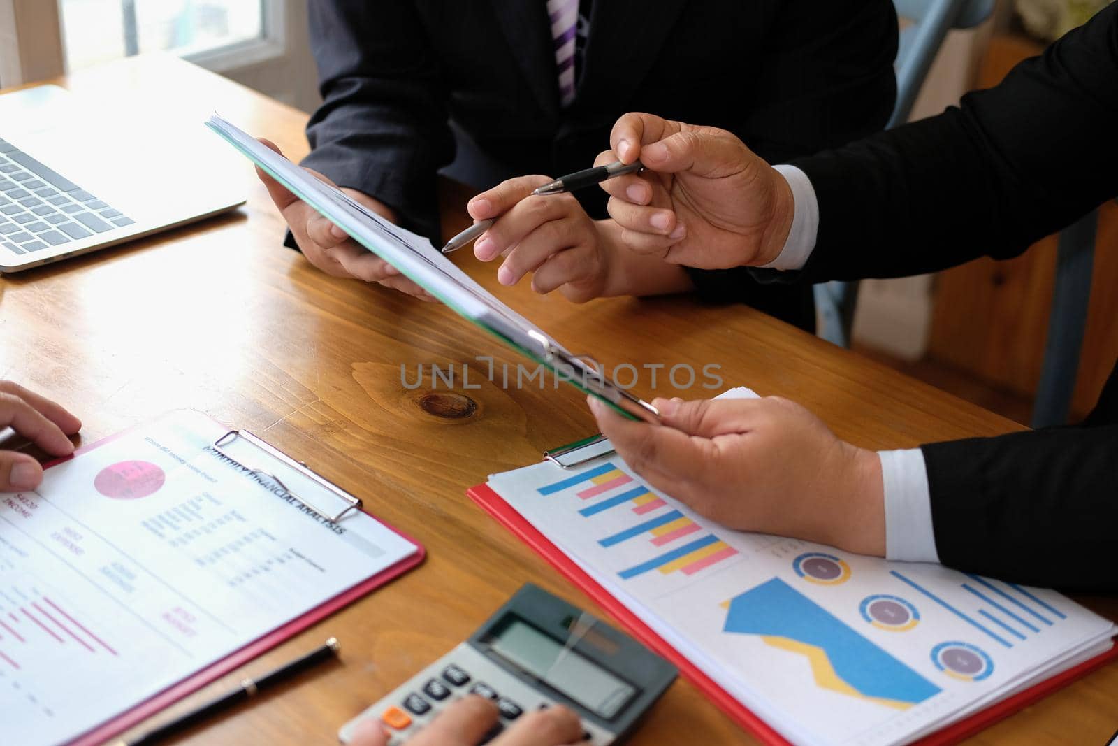 business adviser discussing idea at meeting. professional investor analyzing financial revenue.  businessman working with team. by pp99