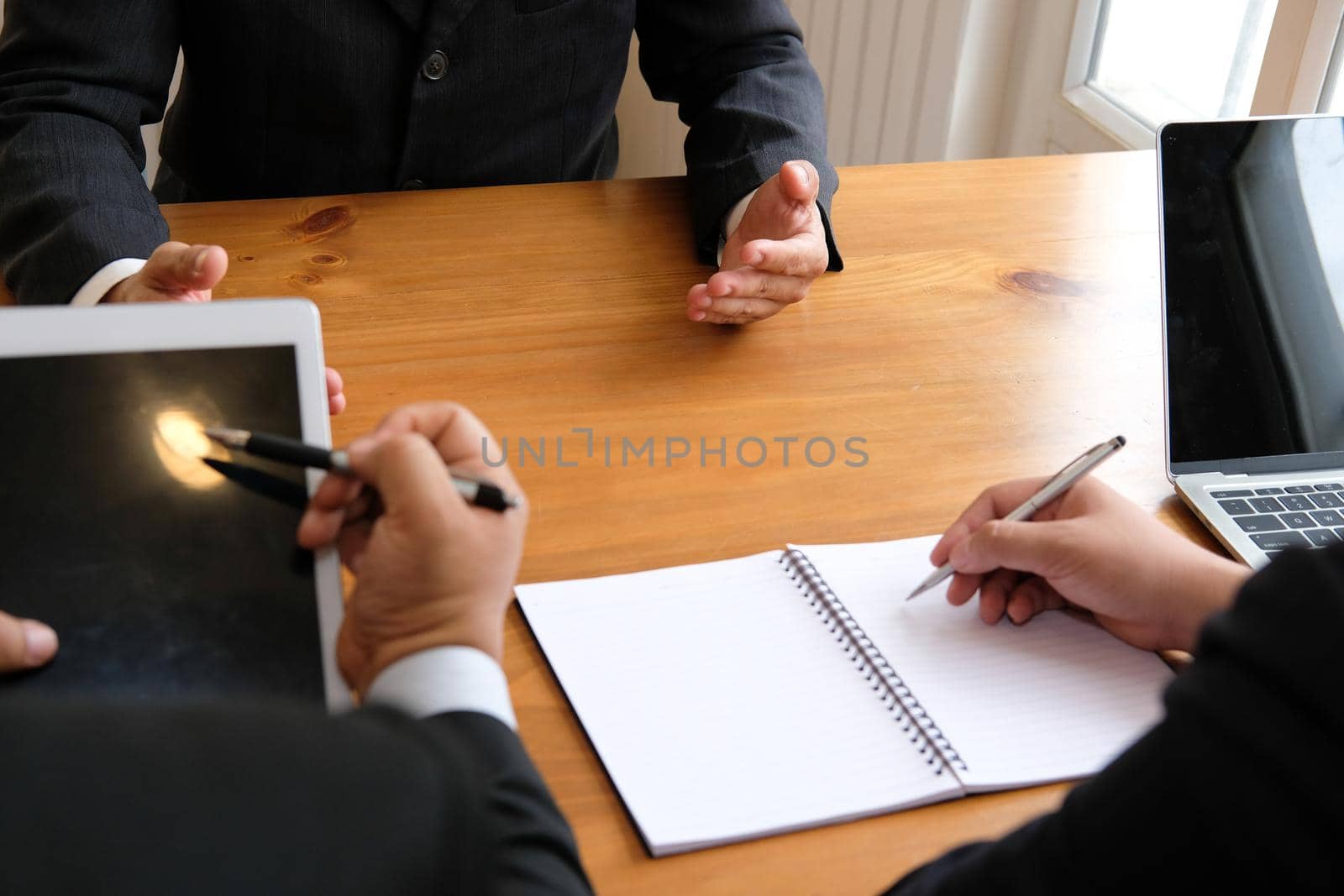 businessman talking to candidate in job interview. manager listen to applicant answer. job seeker explaining his performance to employer by pp99