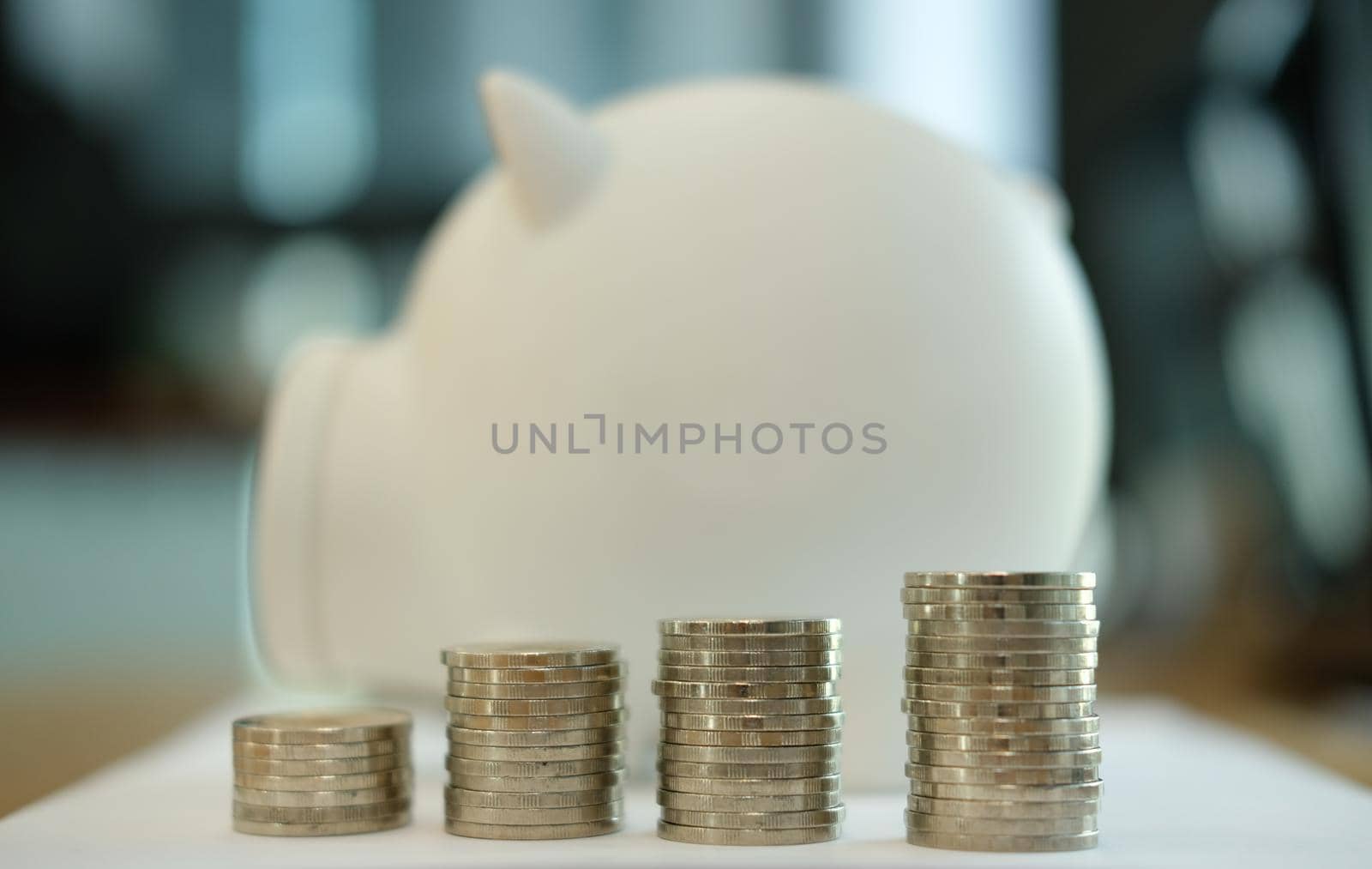coin & white piggy bank. money savings, cash deposit concept