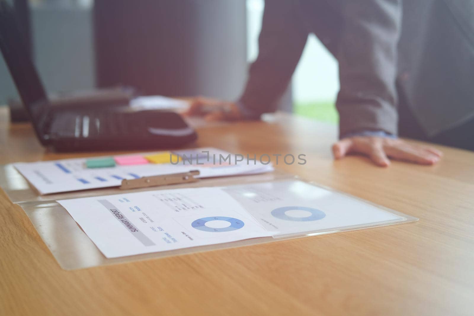 man thinking, businessman working with graph chart document at workplace by pp99