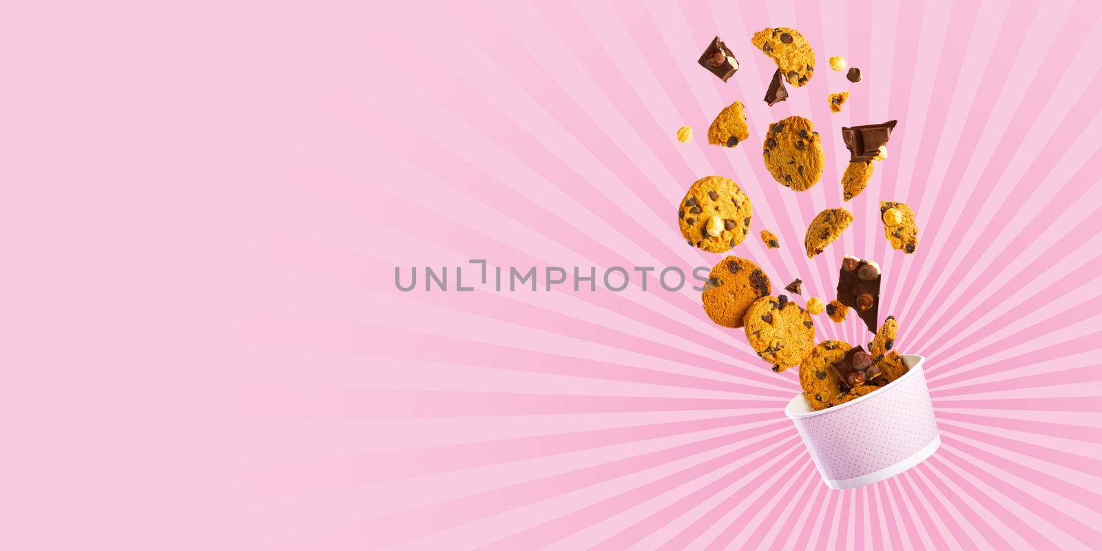 Cookies levitation. falling cookies. Cookies broken in pieces with crumbs. Flying Chocolate cookies