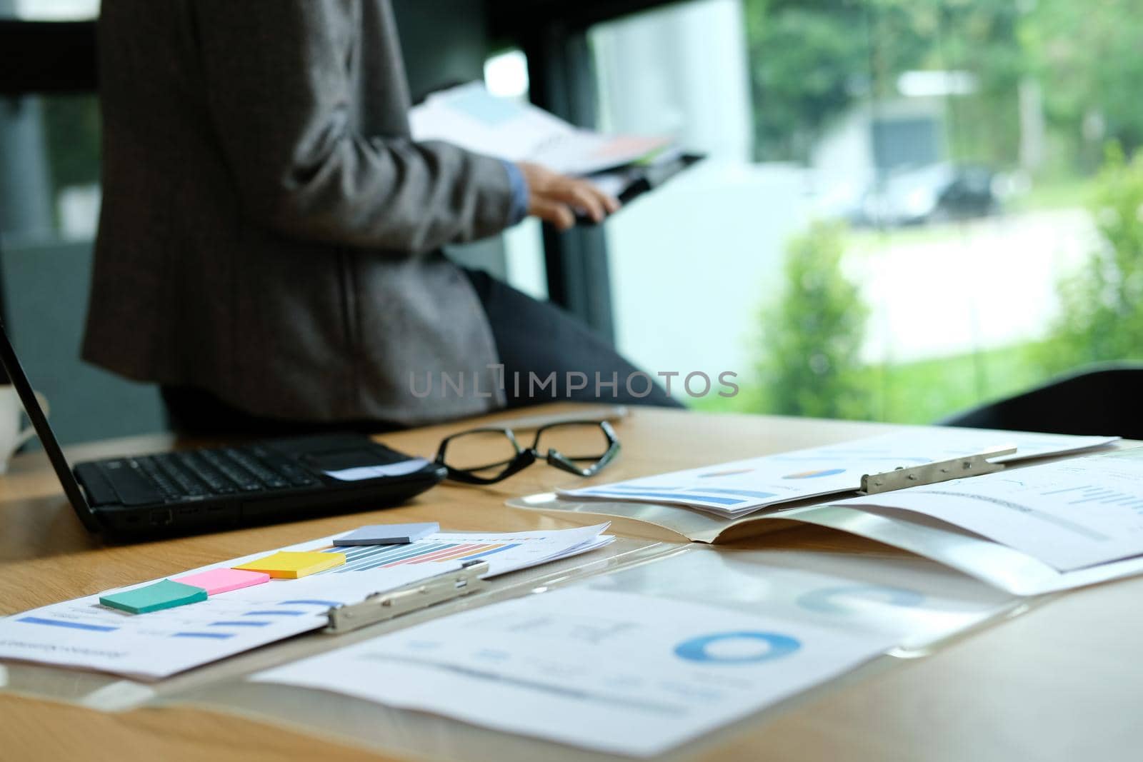 man organize plan with notebook. businessman working at workplace coworking office