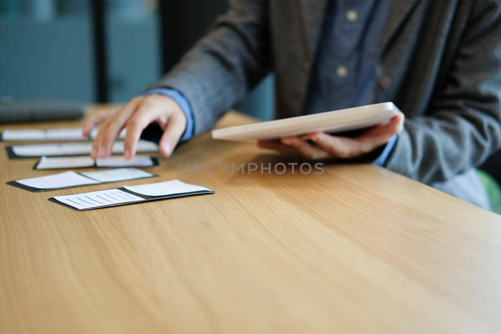 user experience workplace. UX designer desk with tablet layout. UI planning mobile application.