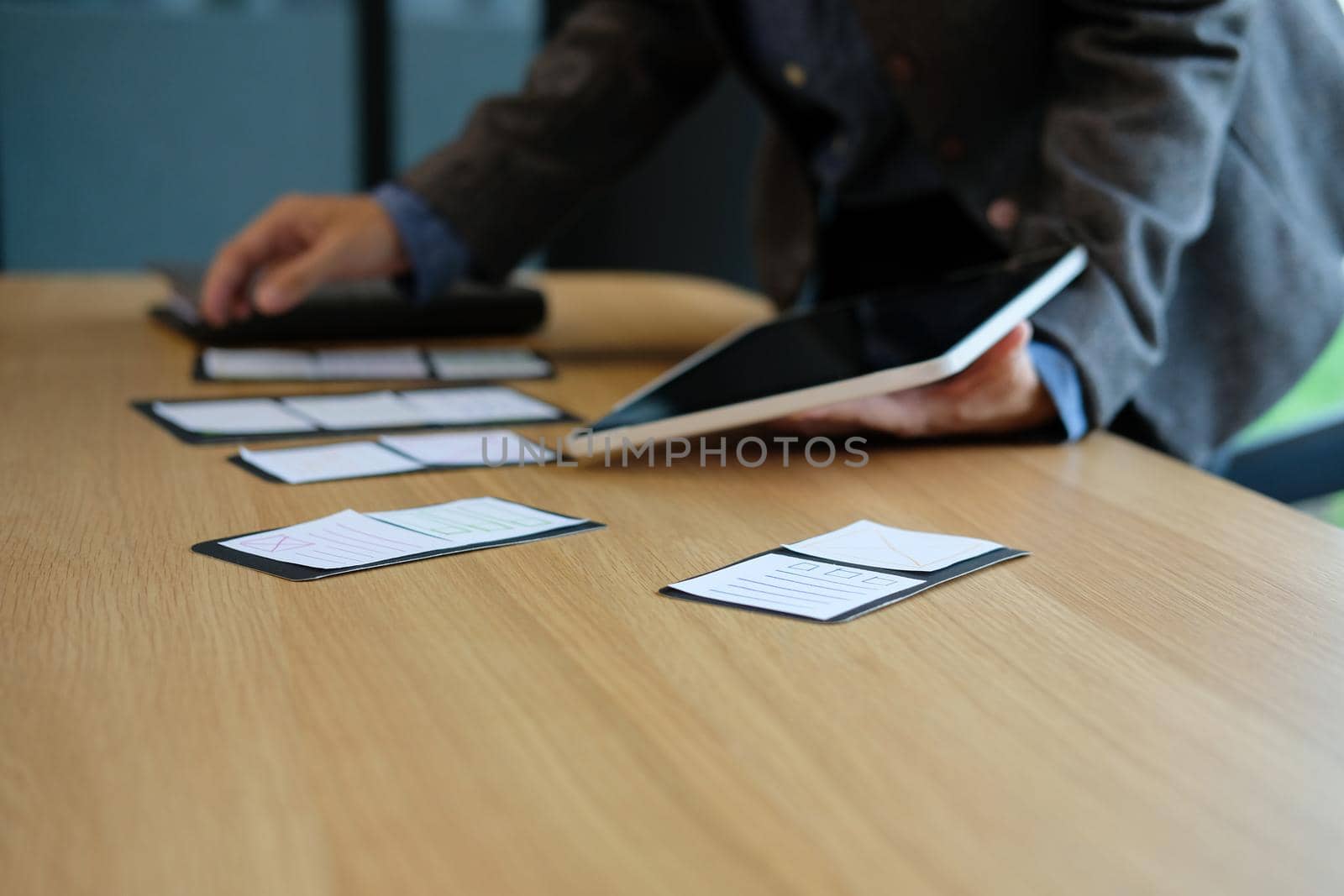 user experience workplace. UX designer desk with tablet layout. UI planning mobile application.