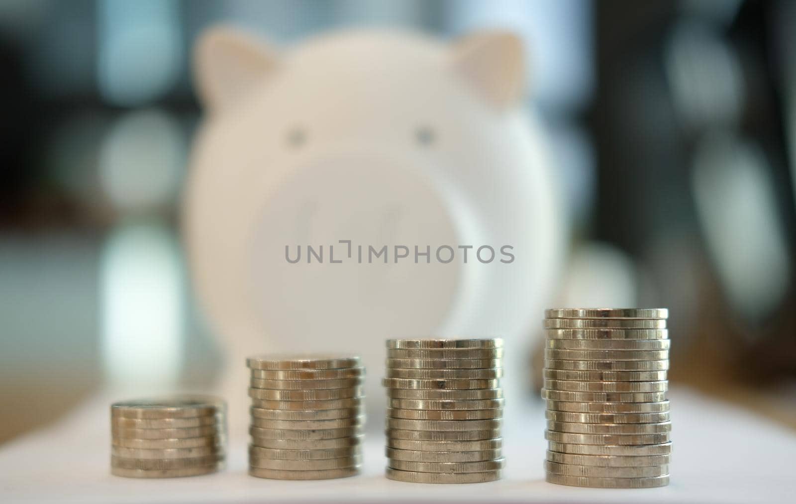 coin & white piggy bank. money savings, cash deposit concept