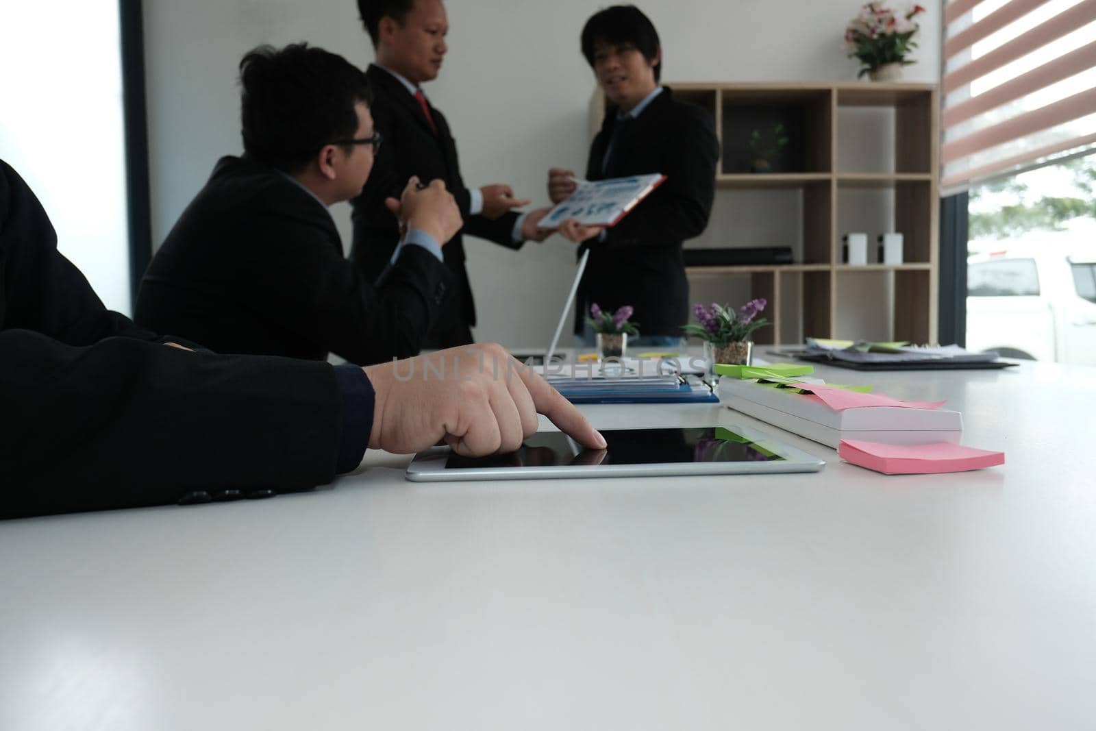 business people have meeting. businessman working with financial plan report. startup man discussing idea at workplace. teamwork, corporate concept. by pp99