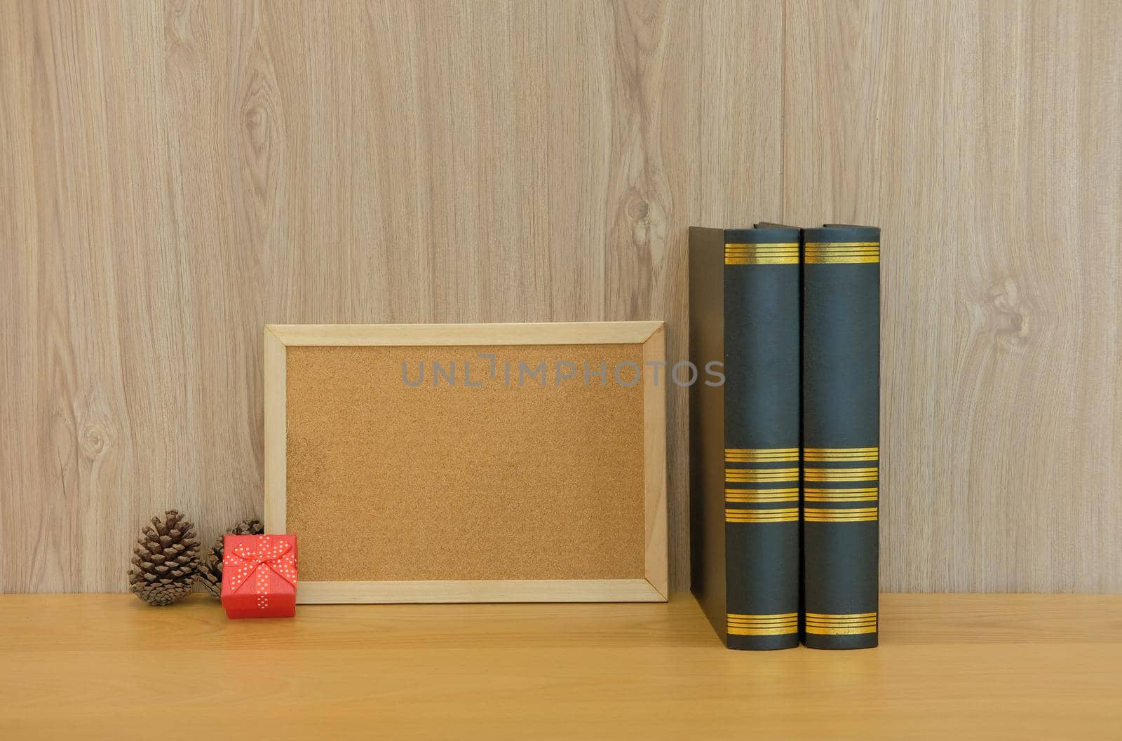 blank cork board book with pine cone & gift box. christmas new year holiday festival.