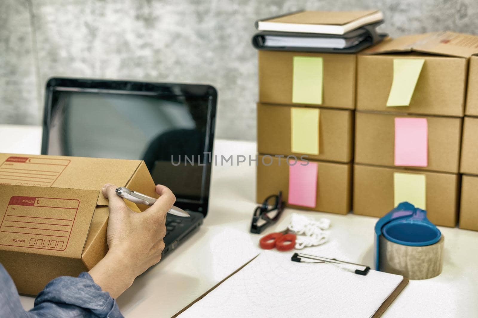 startup business owner hold cardboard box. woman seller prepare parcel box for delivery.  Online selling, e-commerce concept by pp99