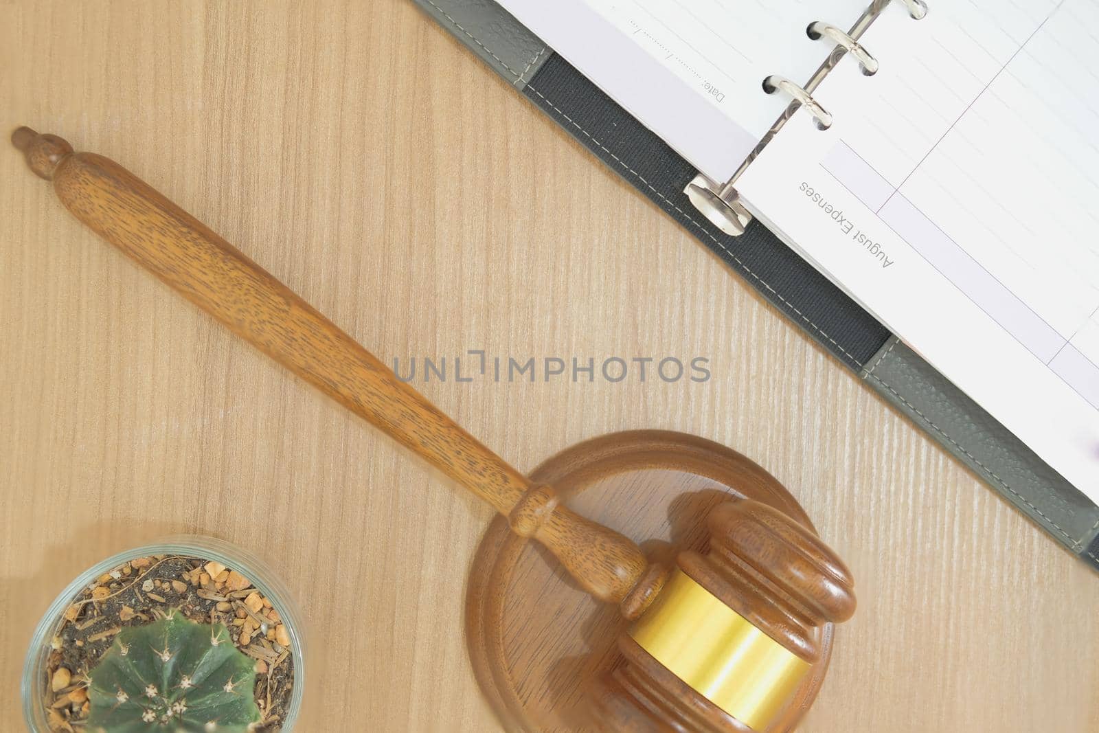 judge gavel & notebook at courtroom. lawyer attorney justice workplace by pp99
