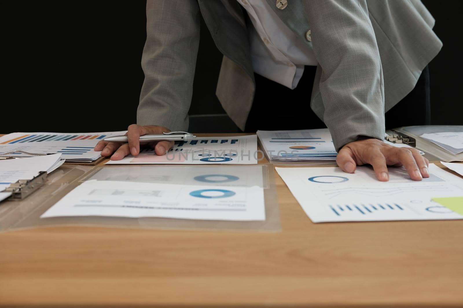 startup businessman working with document at office. young man entrepreneur analyze financial data at workplace.
