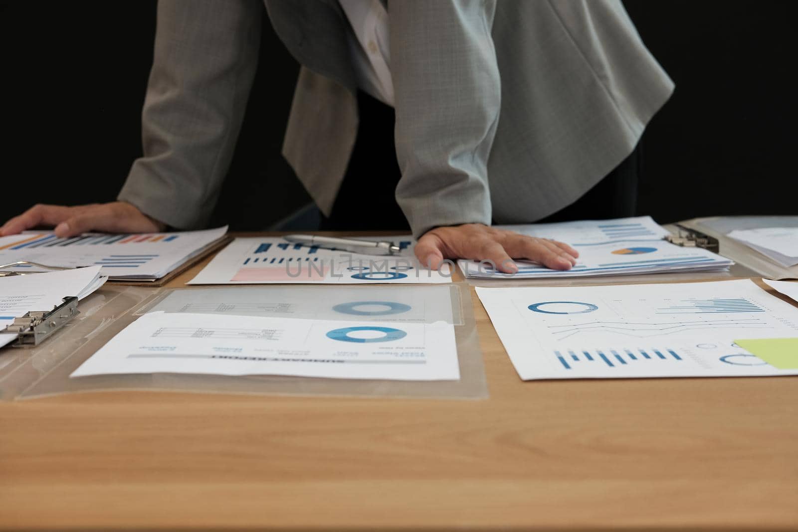 startup businessman working with document at office. young man entrepreneur analyze financial data at workplace.