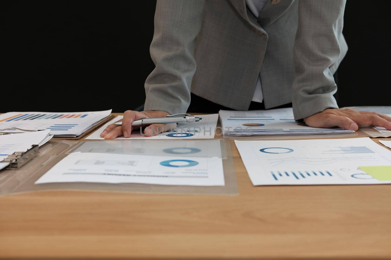startup businessman working with document at office. young man entrepreneur analyze financial data at workplace.