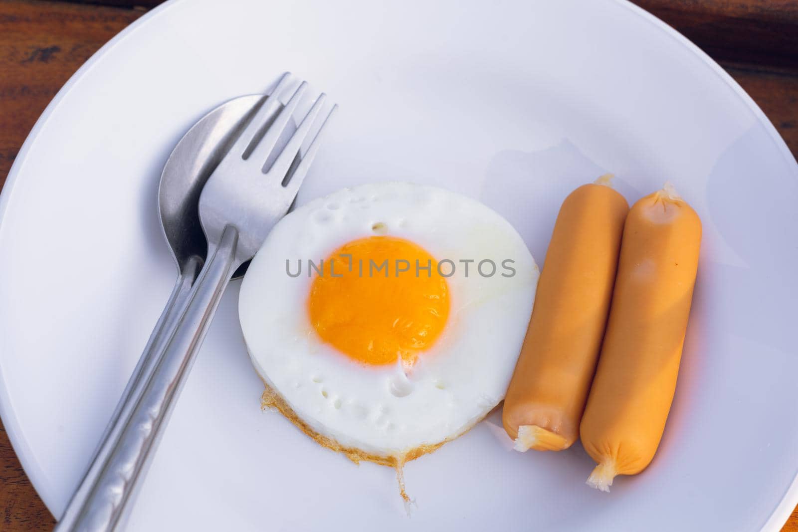 Nutritious breakfast sausage egg for health by iPixel_Studio