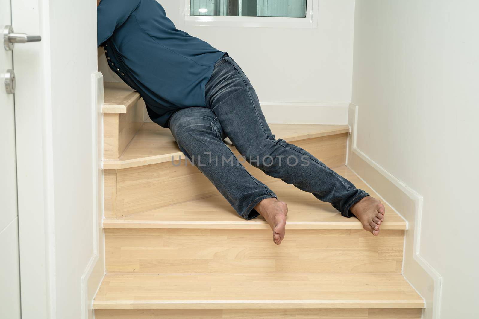 Asian lady woman patient fall down the stairs because slippery surfaces