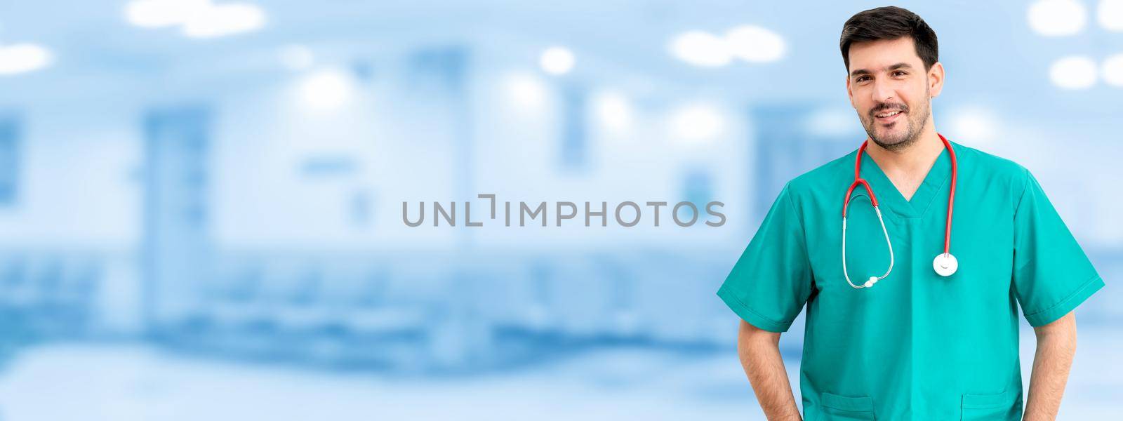 Portrait of male surgeon at the hospital. Medical healthcare and doctor staff service.