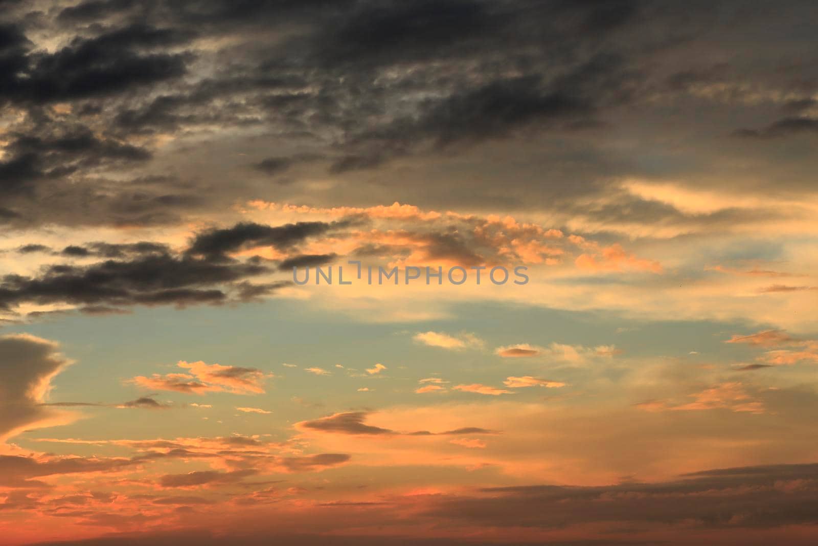 photograph of the sunrise from the sea and the beautiful sky and morning clouds